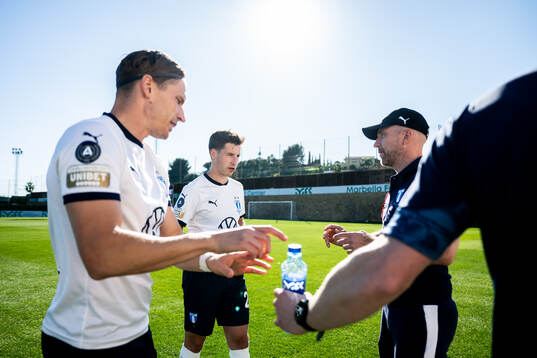 Jens Stryger Larsen, Lasse Berg Johnsen and head coach