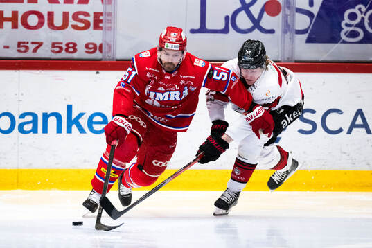 Timrås Anton Lander och Malmö Redhawks Robin Salo