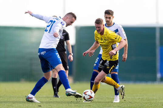 Mateusz Matras of FKS Stal Mielec and Emil Holten of