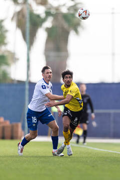 Piotr Wlazlo of FKS Stal Mielec and Ahmed Qasem of Elfsborg