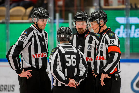 Domare Mikael Nord och Domare Filip Granrud och Linjedomare