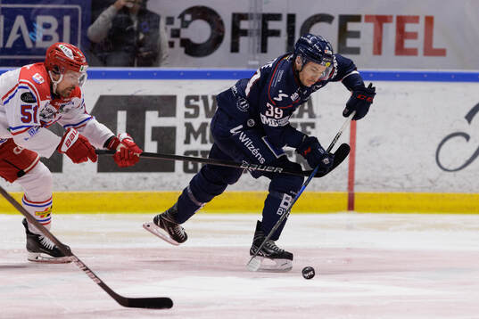 Timrås Anton Lander och Linköpings Ty Rattie