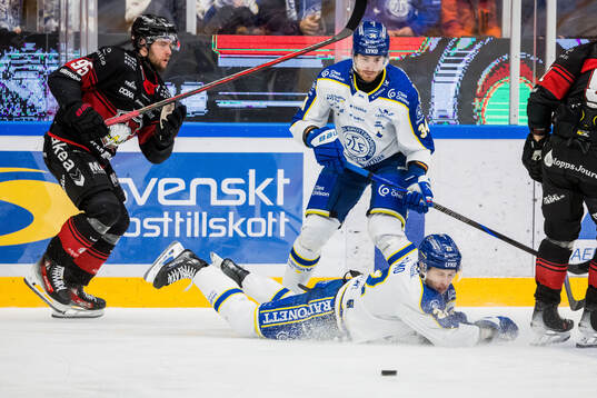 Malmö Redhawks Carl Persson och Leksands Lukas Vejdemo och