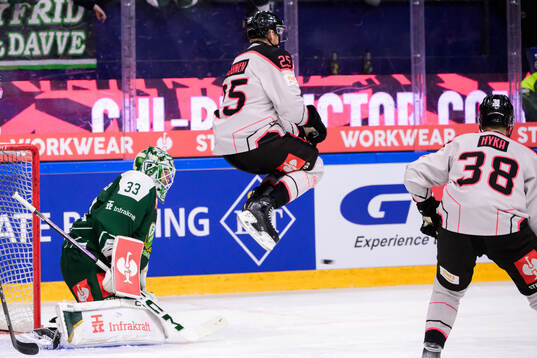 goaltender Maxime Lagacé of Färjestad  and Jani Lajunen