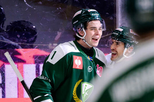 Viktor Lodin and Michael Lindqvist of Färjestad  celebrates
