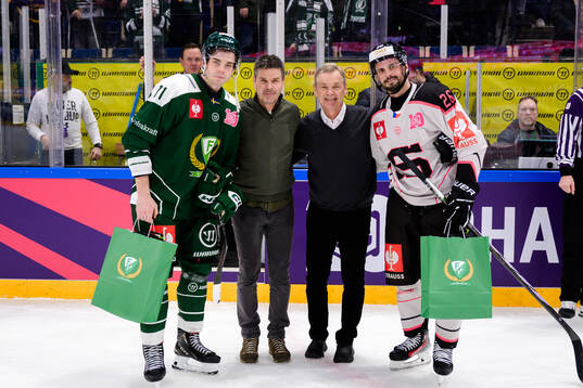 Viktor Lodin of Färjestad  and Michal Repik of Sparta