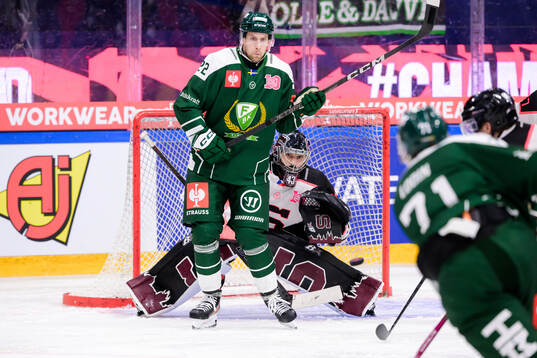 Per Åslund of Färjestad  and goaltender Jakub Kovar of
