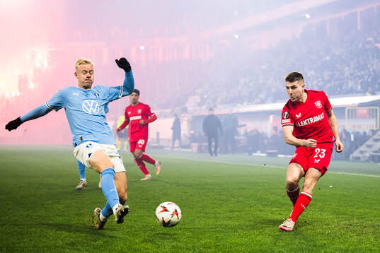 Otto Rosengren of Malmö FF and of Twente Michal Sadilek