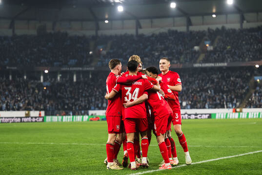 Sem Steijn of Twente celebrate with team mates