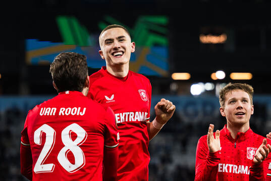 Gustaf Lagerbielke of Twente celebrates with team mates
