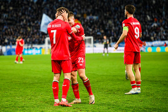 Mitchell Van Bergen and Michal Sadilek of Twente celebrate
