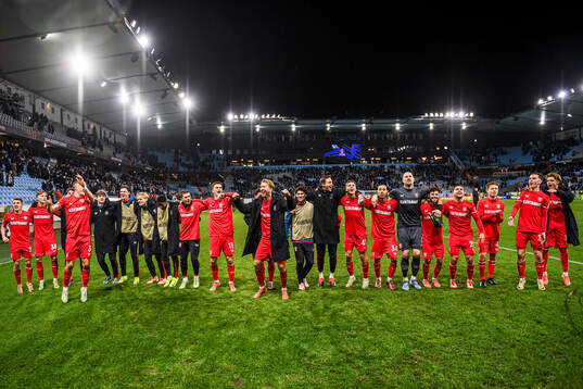 Players of Twente celebrate