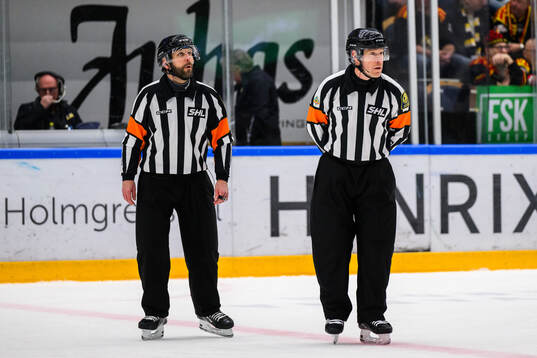 Domare Tobias Björk  och Domare Marcus Linde