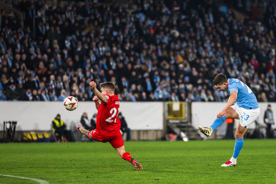 Lasse Berg Johnsen of Malmö FF scores 1-1