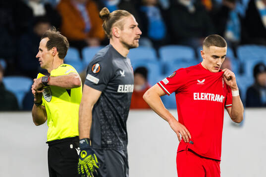 goalkeeper Lars Unnerstall and Gustaf Lagerbielke of Twente