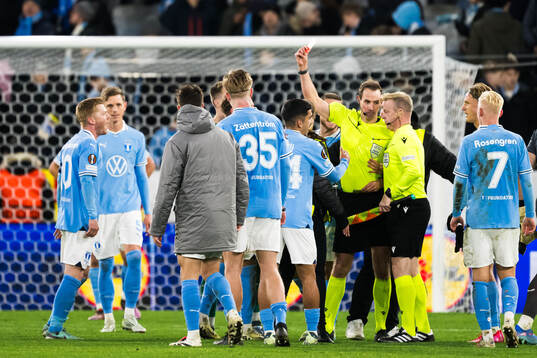 Anders Christiansen of Malmö FF receives a red card
