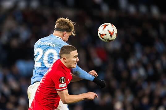 Erik Botheim of Malmö FF and Gustaf Lagerbielke of Twente