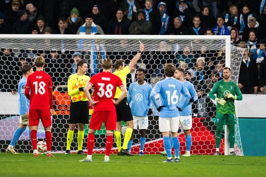 Gabriel Busanello of Malmö FF recieves a yellow card