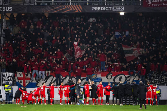 Players of Twente celebrate