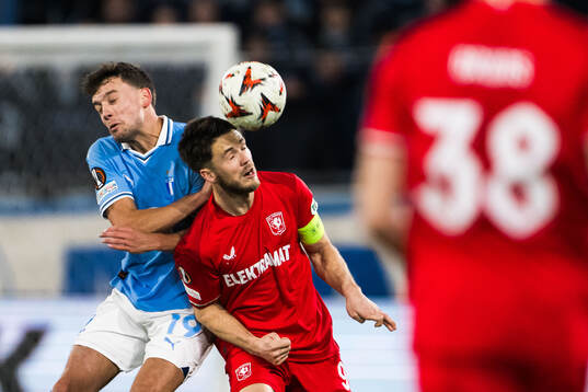 Colin Rösler of Malmö FF and Ricky van Wolfswinkel of