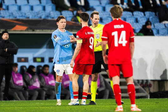 Jens Stryger Larsen of Malmö FF and Ricky van Wolfswinkel