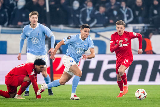 Lasse Berg Johnsen of Malmö FF and Sem Steijn of Twente