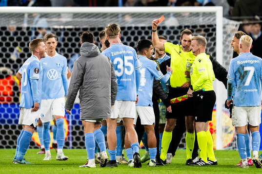 Anders Christiansen of Malmö FF receives a red card from