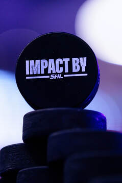 Matchpuck med Impact by SHL logo