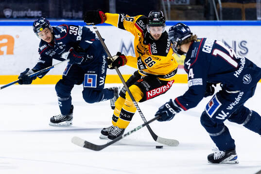 Linköpings Ty Rattie och Eddie Genborg mot Luleås Mathias