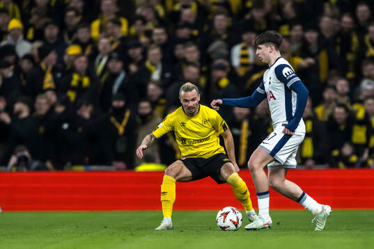 Niklas Hult of Elfsborg and Mikey Moore of Tottenham Hotspur