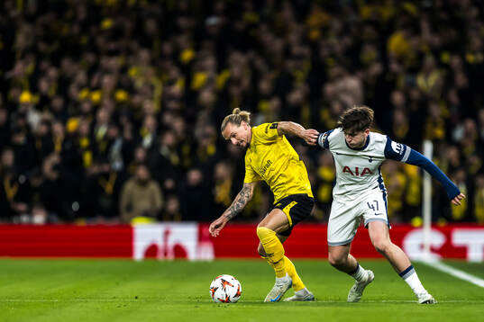 Niklas Hult of Elfsborg and Mikey Moore of Tottenham Hotspur
