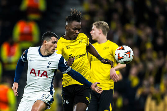 Pedro Porro of Tottenham Hotspur and Jalal Abdullai of