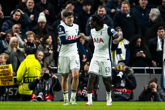 Mikey Moore and Ayindamola Ajayi of Tottenham Hotspur