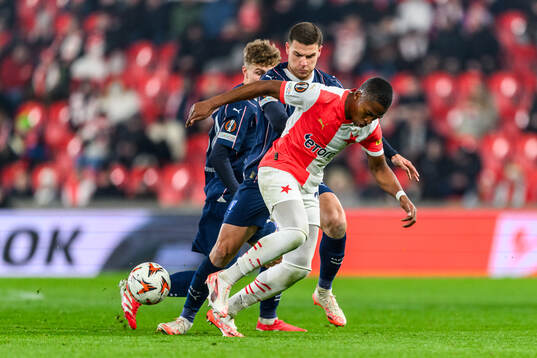 Gabriel Busanello of Malmö FF and Simion Michez of Slavia