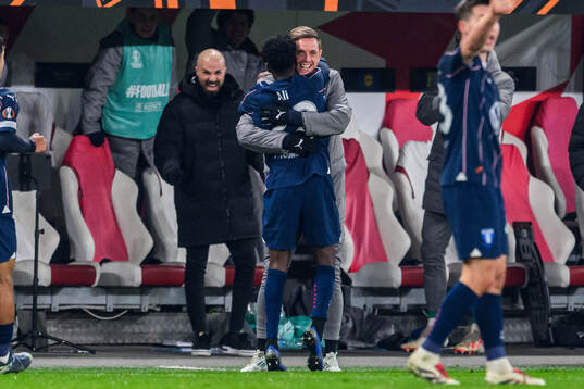 Søren Rieks and Taha Ali of Malmö FF celebrate