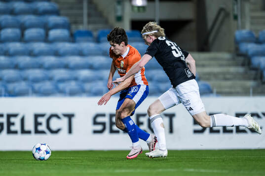 Eman Markovic of IFK Göteborg and Tobias Dahl of Rosenborg