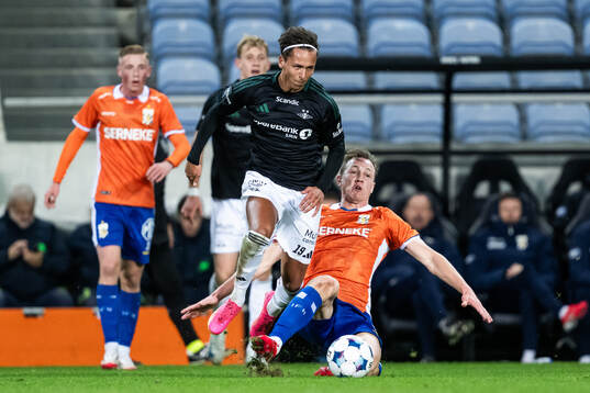 Adrian Pereira of Rosenborg and Adam Carlén of IFK