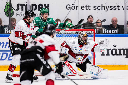 Malmö Redhawks Johan Ivarsson och Rögles Brady Ferguson