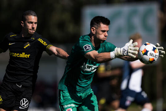 Dino Besirovic of AIK and Goalkeeper Jesper Hansen of AGF