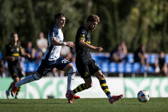 Mikkel Duelund of AGF Århus and Anton Salétros of AIK