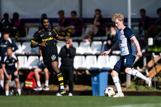 Alexander Fesshaie of AIK and Tobias Mølgaard of AGF Århus