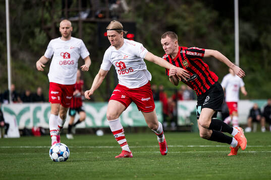 Daniel Eid of Fredrikstad and Victor Lind of Brommapojkarna