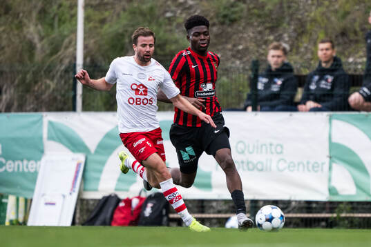 Simen Rafn of Fredrikstad and Ezekiel Alladoh of