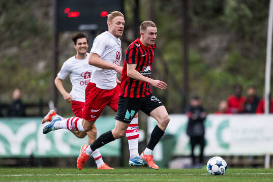 Mads Nielsen of Fredrikstad and Victor Lind of