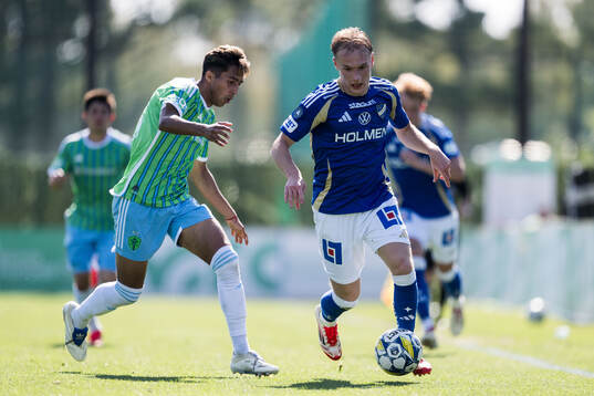 Danny Leyva of Seattle Sounders FC and Marcus Baggesen of