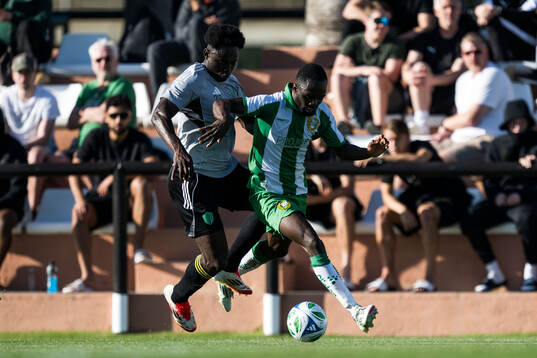 Yeimar of Seattle Sounders FC and Adam Akimey of Hammarby
