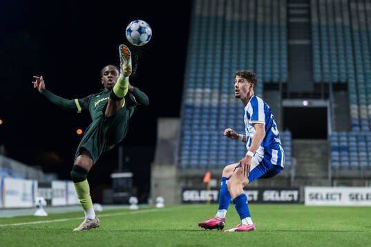 Vonnte Williams of Brentford B and Ramon Pascal Lundqvist