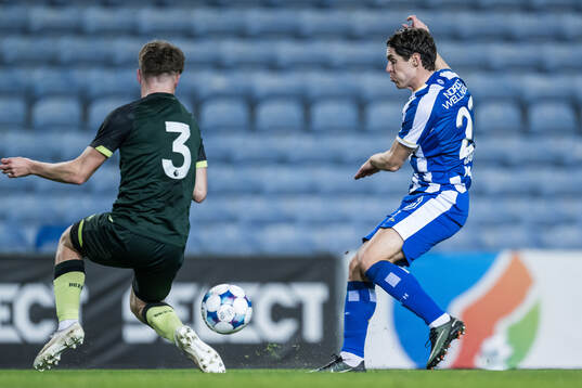 Conor McManus of Brentford B and Eman Markovic of IFK