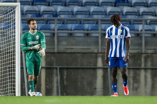 Goalkeeper Elis Bishesari and Rockson Yeboah of IFK