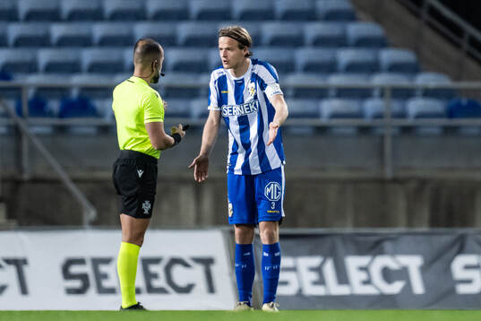 Referee MArcos Brazao and August Erlingmark of IFK Göteborg